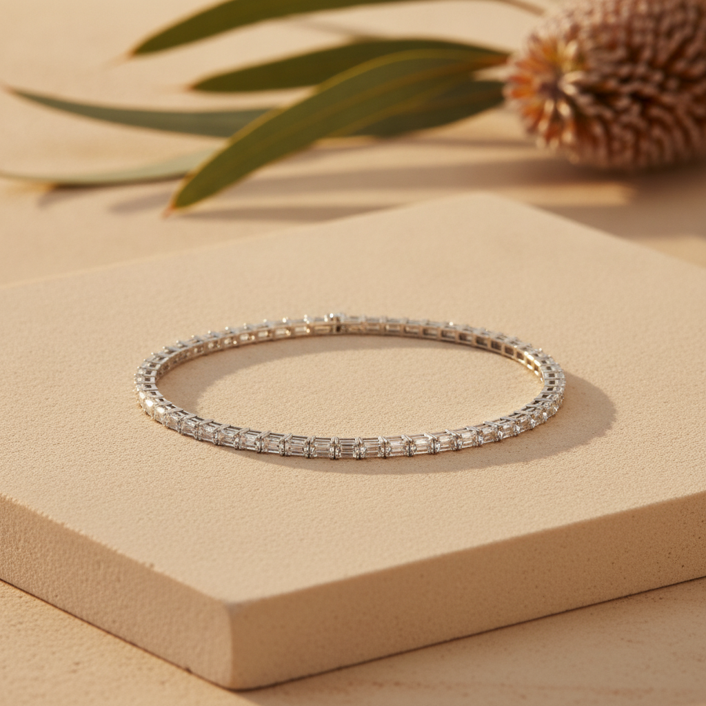 Diamond tennis bracelet on warm sandstone with native banksia — handcrafted in the Byron Bay Hinterland by Lucano