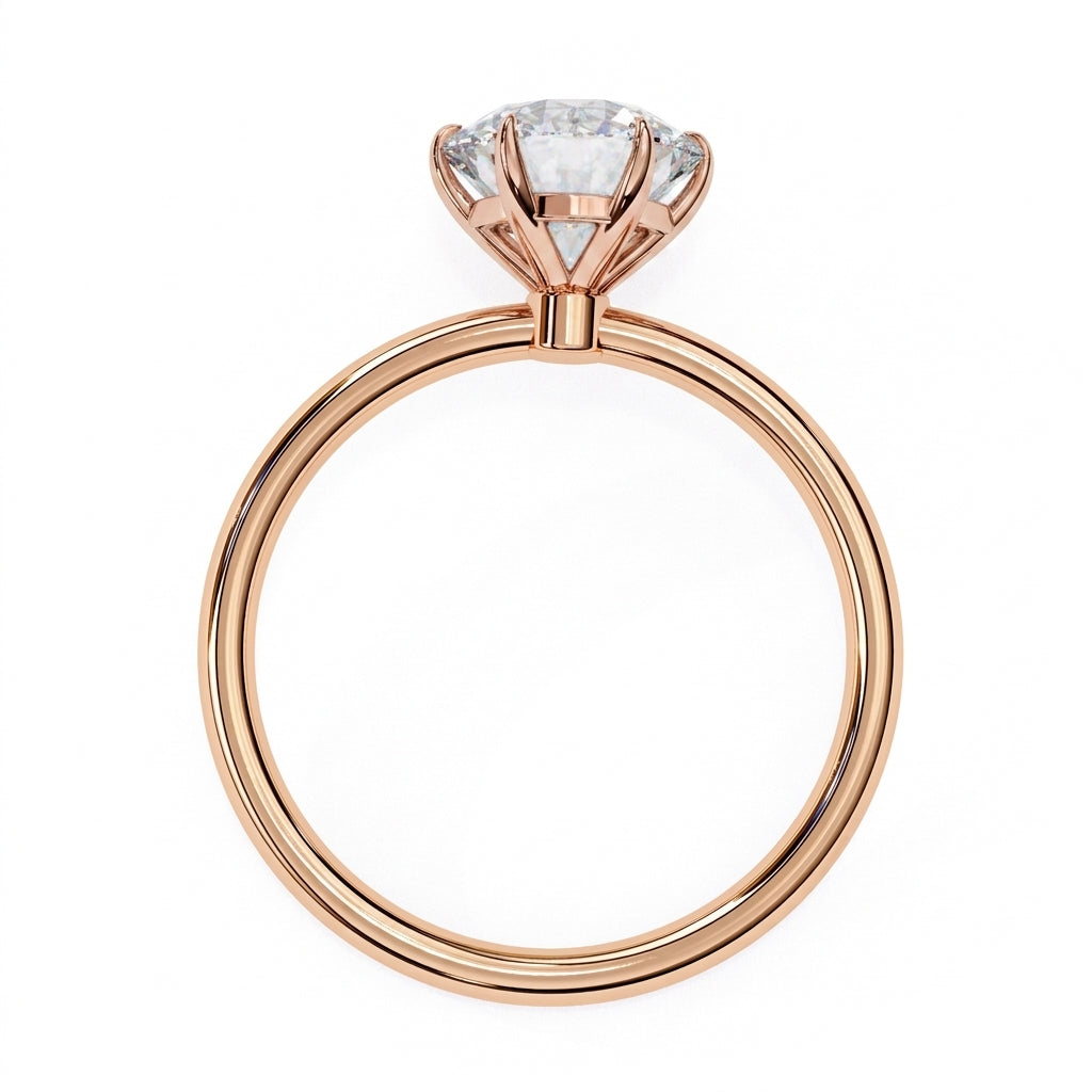 Helios Round Solitaire Lumière - round brilliant engagement ring on a slim band - Lucano