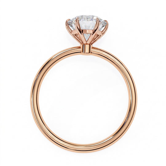 Helios Round Solitaire Lumière - round brilliant engagement ring on a slim band - Lucano