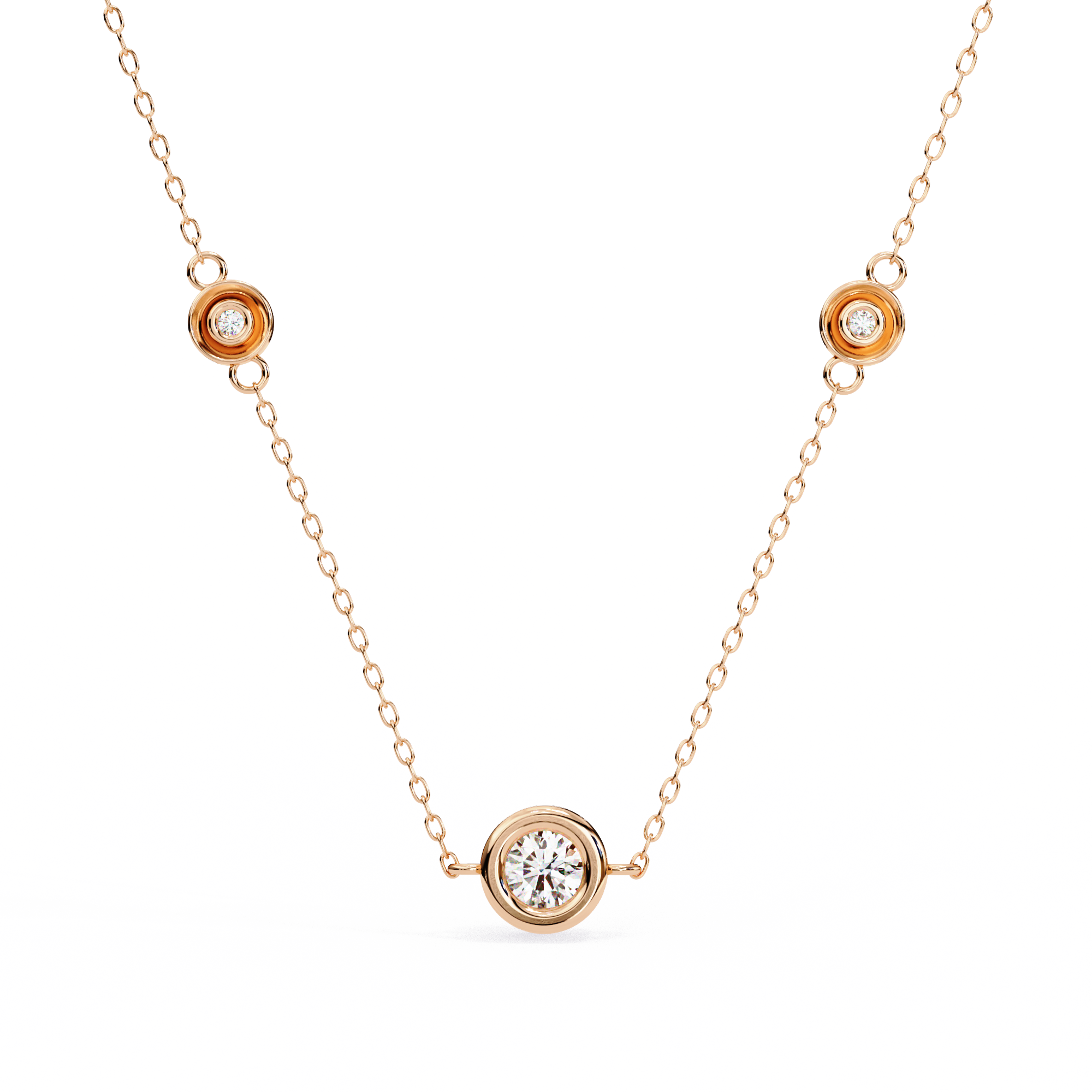 Stelle Trio bezel diamond necklace on a delicate gold cable chain