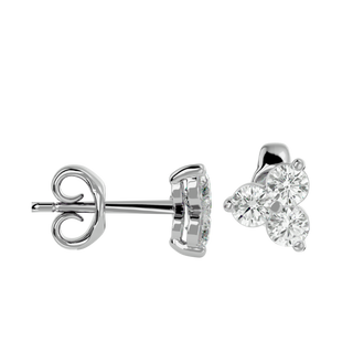 Trinity Earrings, three-stone diamond stud earrings by Lucano, worn detail