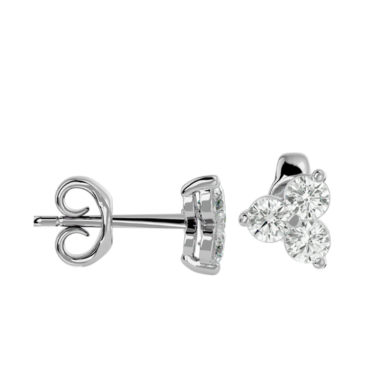 Trinity Earrings, three-stone diamond stud earrings by Lucano, worn detail