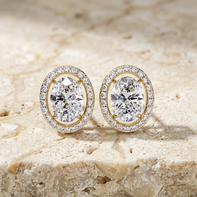 Ovale Halo Studs, oval-cut diamond halo stud earrings by Lucano, front view