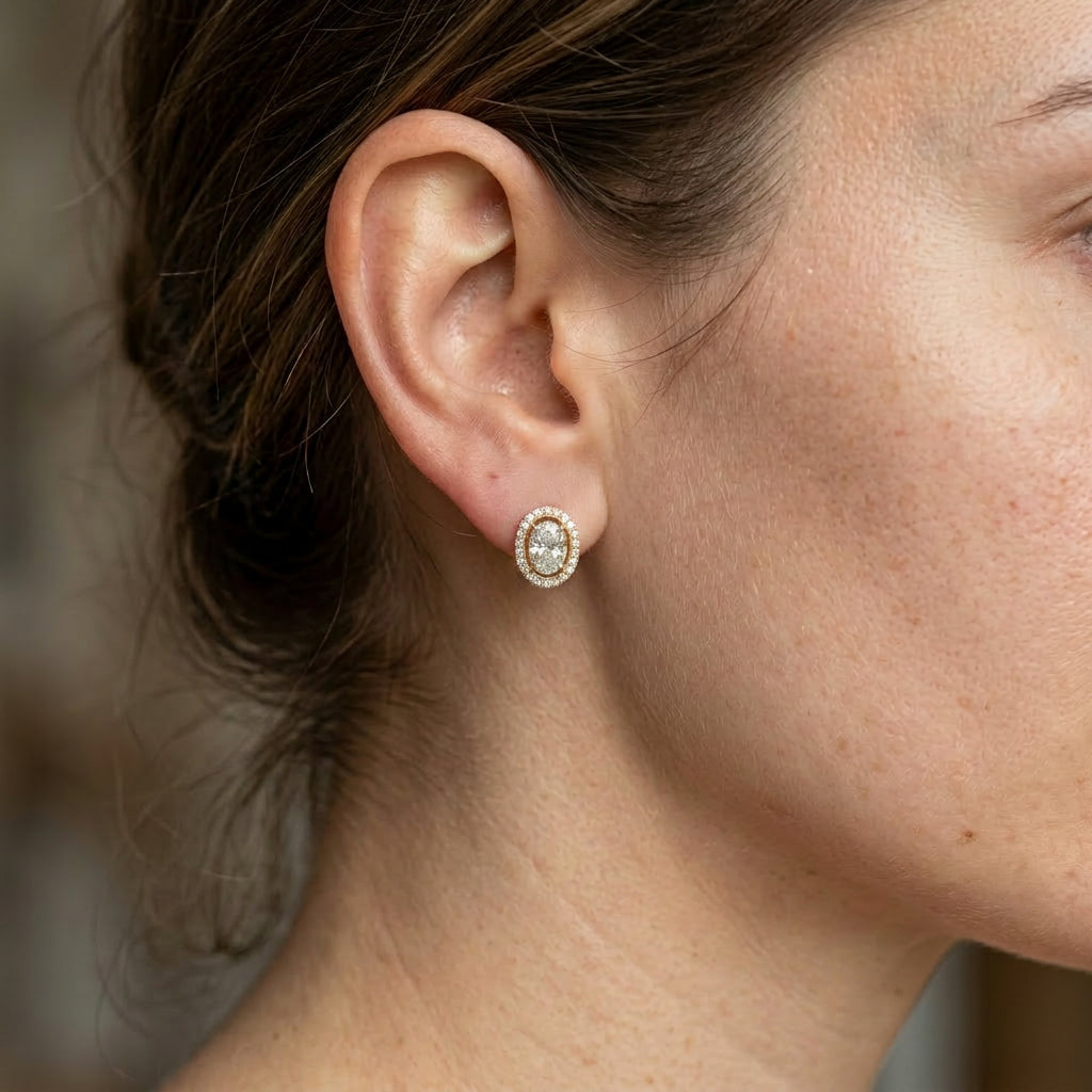 Ovale Halo Studs, oval-cut diamond halo stud earrings by Lucano, detail close-up