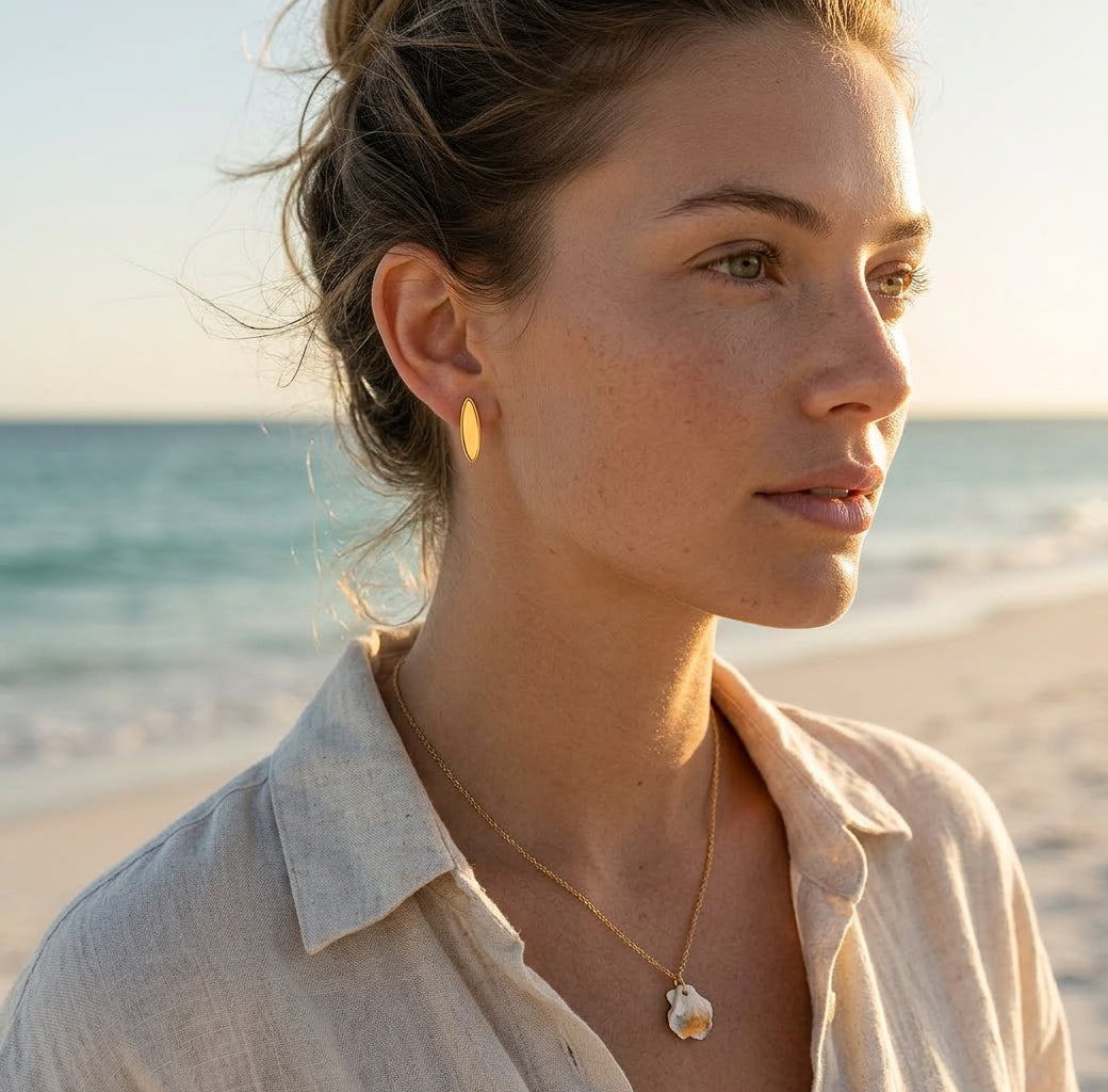 Longboard Earrings, gold drop earrings handcrafted by Lucano, Byron Bay, side view
