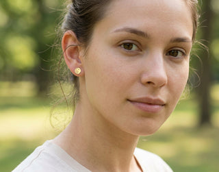 Yin Yang Earrings, gold yin yang earrings handcrafted by Lucano, Byron Bay, side view