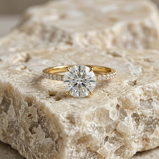 Mira Round Pavé Solitaire - round brilliant pavé engagement ring - on hand - Lucano