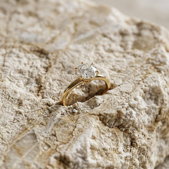 Helios Round Solitaire Lumière - round brilliant engagement ring - on hand - Lucano