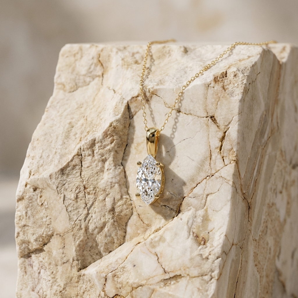 Navette marquise diamond pendant worn at the collarbone