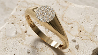 Gold diamond signet ring with a fully pavé-set face, front view
