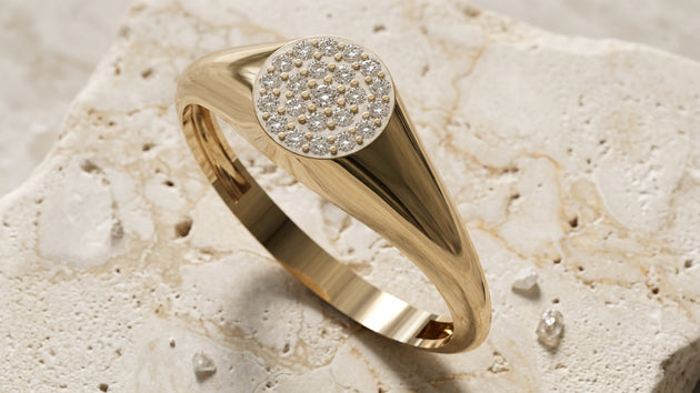 Gold diamond signet ring with a fully pavé-set face, front view