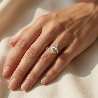 Halo Lumina Pear Solitaire - pear halo engagement ring - angled view - Lucano