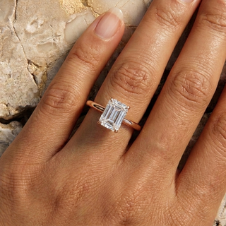 Vesper Emerald Hidden Halo Ring - emerald cut hidden halo engagement ring - angled view - Lucano