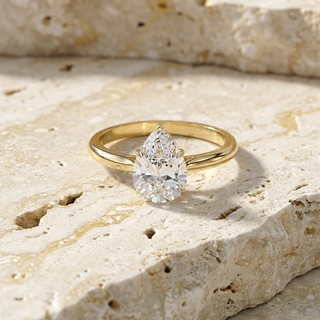 Goccia Pear Solitaire - pear cut solitaire engagement ring - on hand - Lucano