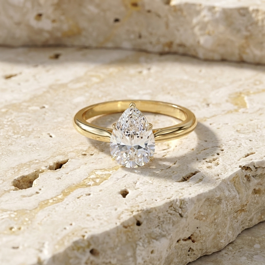 Goccia Pear Solitaire - pear cut solitaire engagement ring - on hand - Lucano