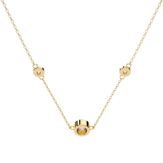 Lucano yellow gold necklace with three bezel-set diamonds on a delicate cable chain. Designed for everyday wear.